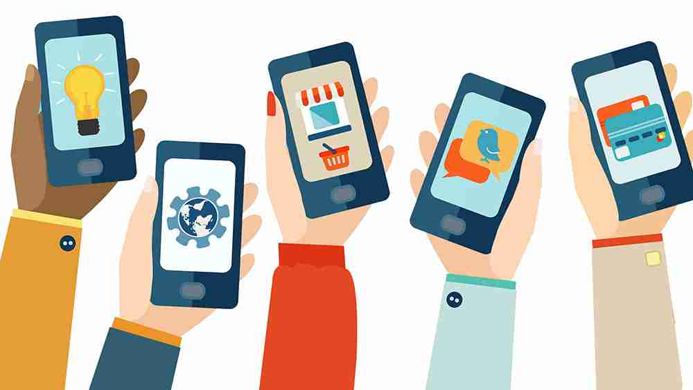 Phones being held up in the air with apps open.